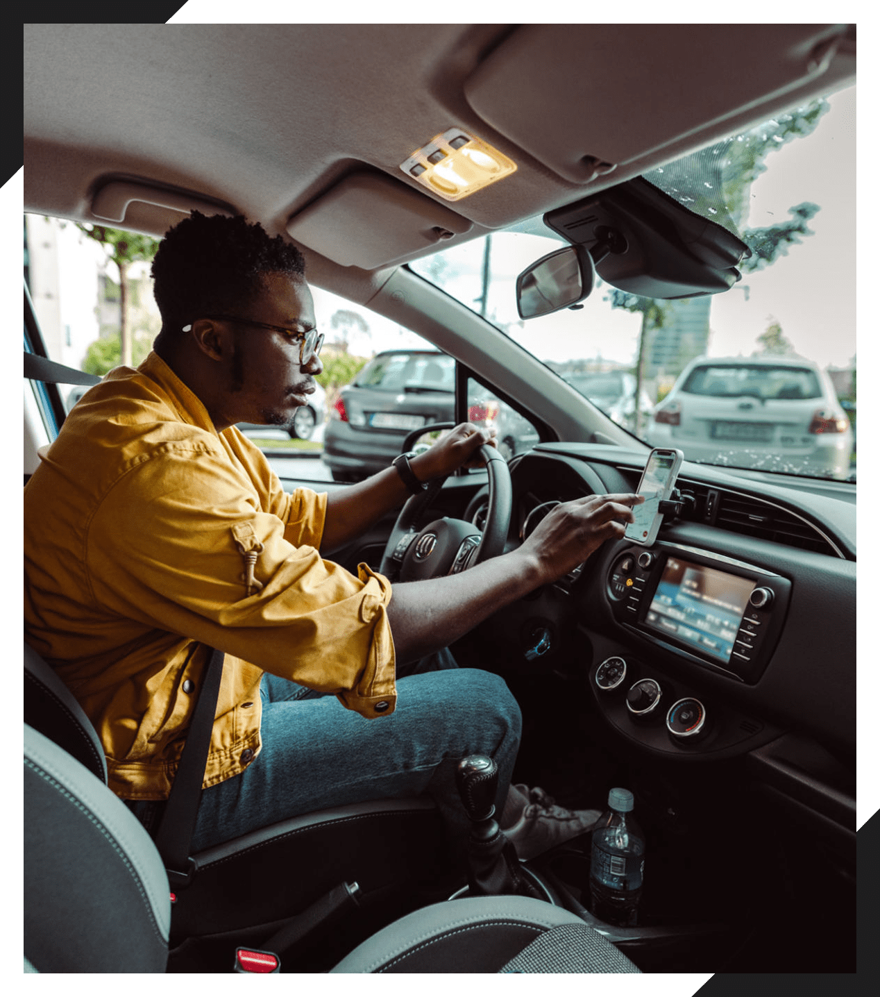 Driver checking phone GPS navigation