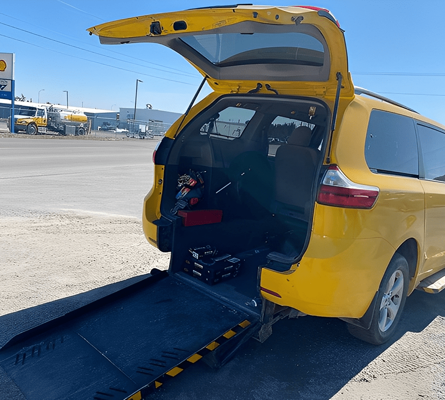 Yellow van with open ramp